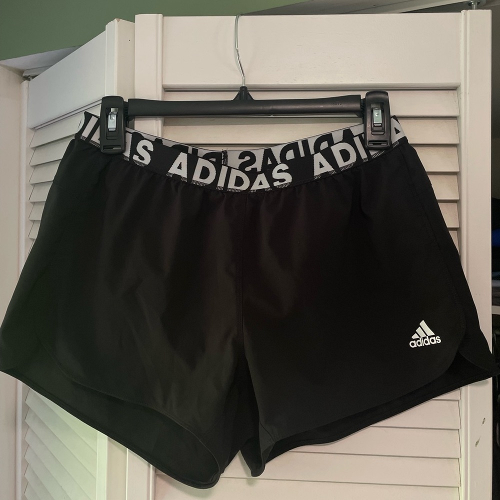 Black Adidas athletic shorts